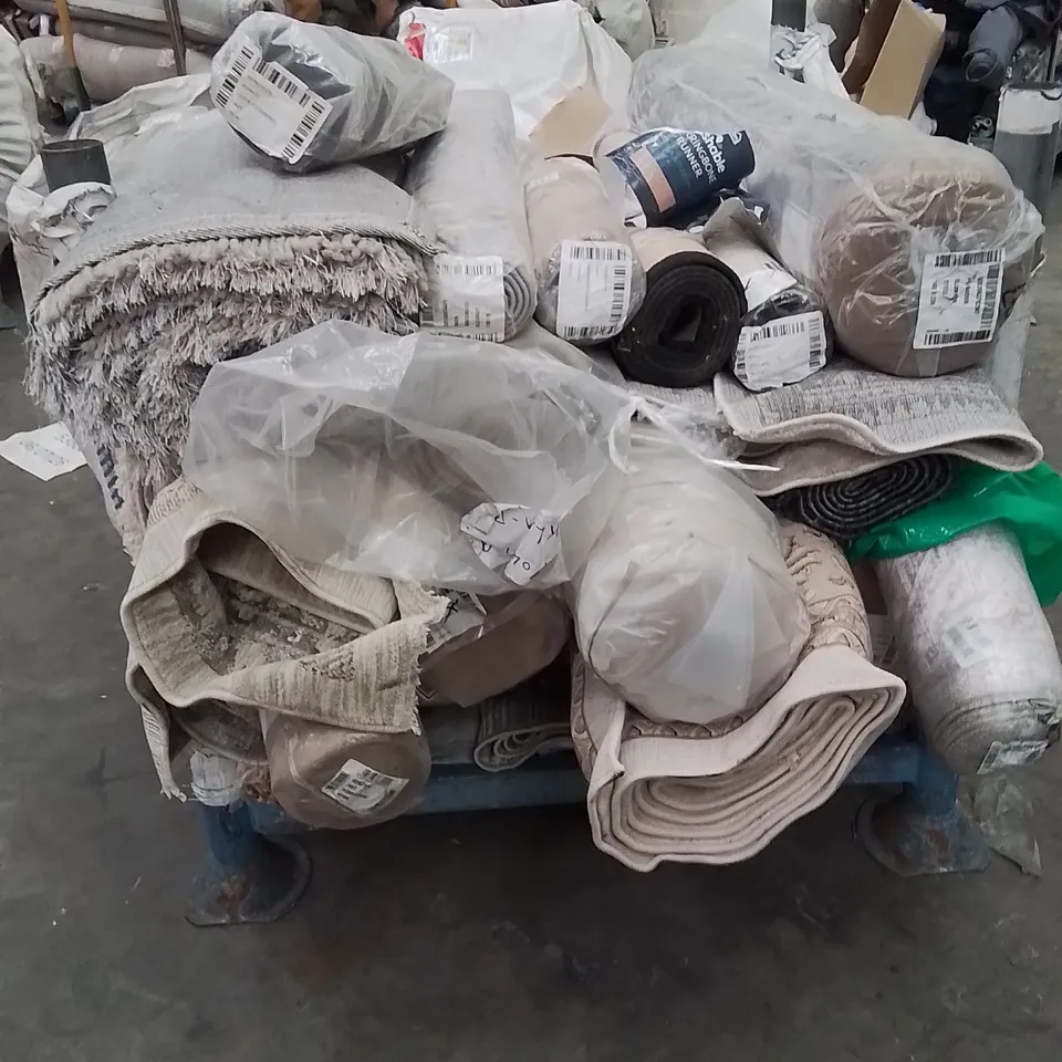 STILLAGE OF APPROXIMATELY 20 QUALITY DESIGNER RUGS