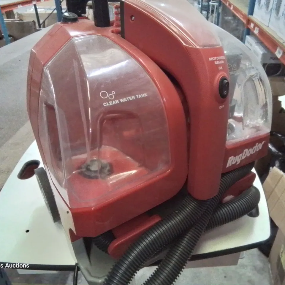 BOXED RUG DOCTOR PORTABLE SPOT CLEANER