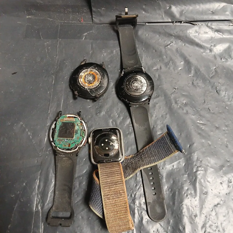 LOT OF 4 ASSORTED HEAVILY DAMAGED SMARTWATCHES TO INCLUDE - APPLE WATCH SERIES 6 - SAMSUNG GALAXY WATCH 4 - 