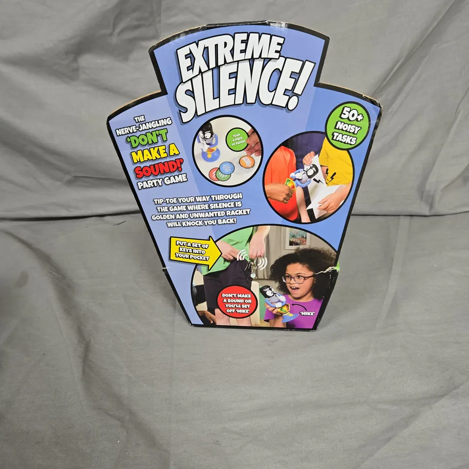 EXTREME SILENCE! NERVE-JANGLING DON'T MAKE A SOUND PARTY GAME – CARDBOARD DISPLAY STAND (TOMY UK LTD)