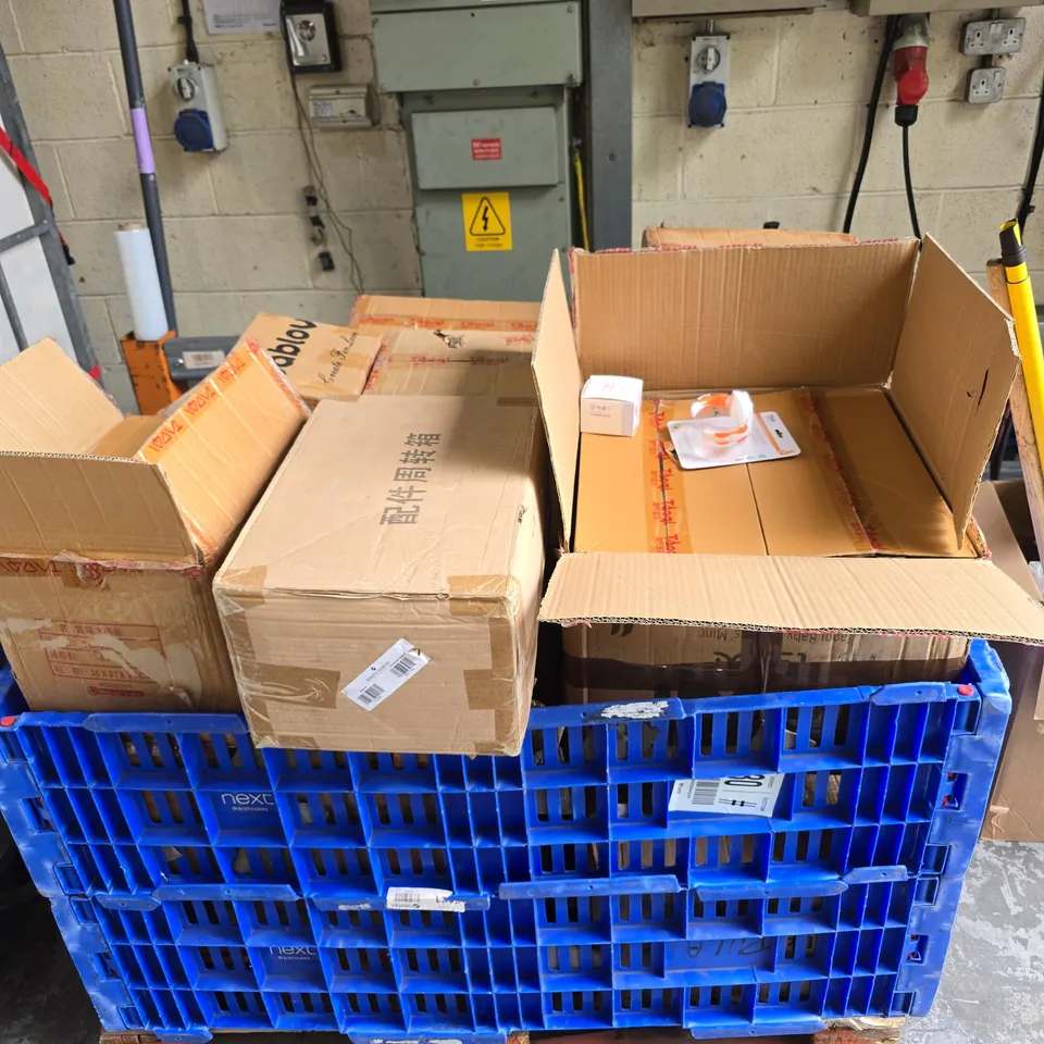 PALLET OF APPROXIMATELY 12 BOXES OF ASSORTED ITEMS INCLUDING BABY BOTTLE HOLDERS AND BABY BOTTLE LIDS 