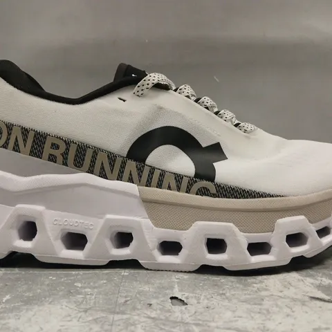 PAIR OF ON CLOUDMONSTER RUNNING SHOES IN WHITE/BLACK SIZE UK 8