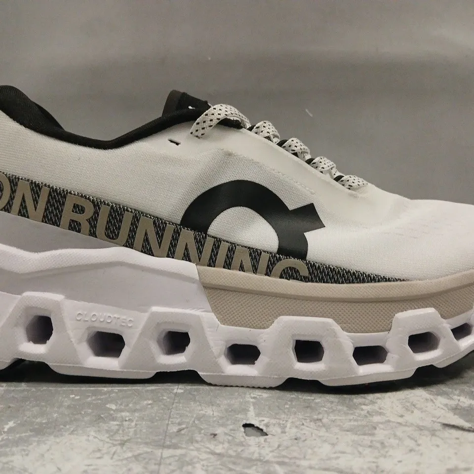 PAIR OF ON CLOUDMONSTER RUNNING SHOES IN WHITE/BLACK SIZE UK 8