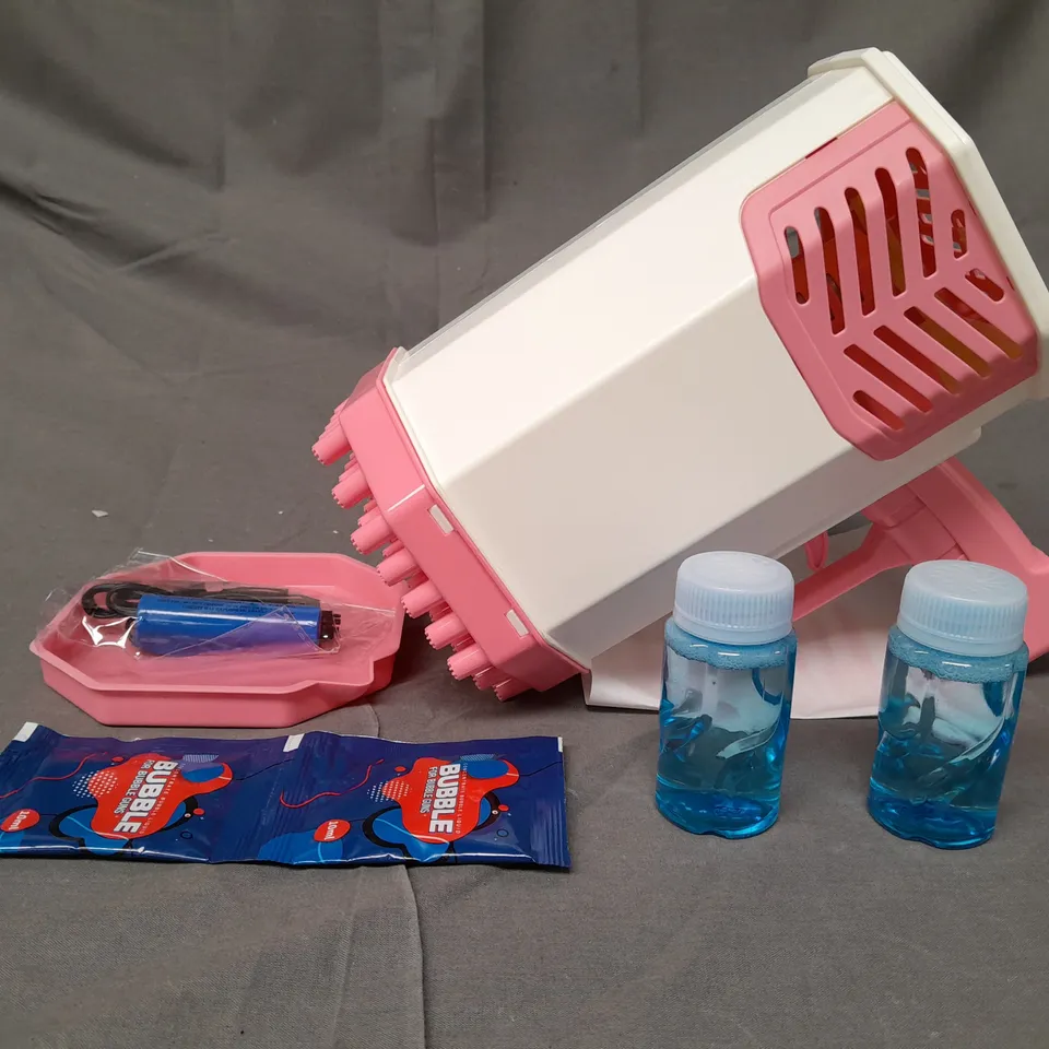 BOXED ROCKET 69 HOLE FOAMING BUBBLE GUN IN WHITE/PINK