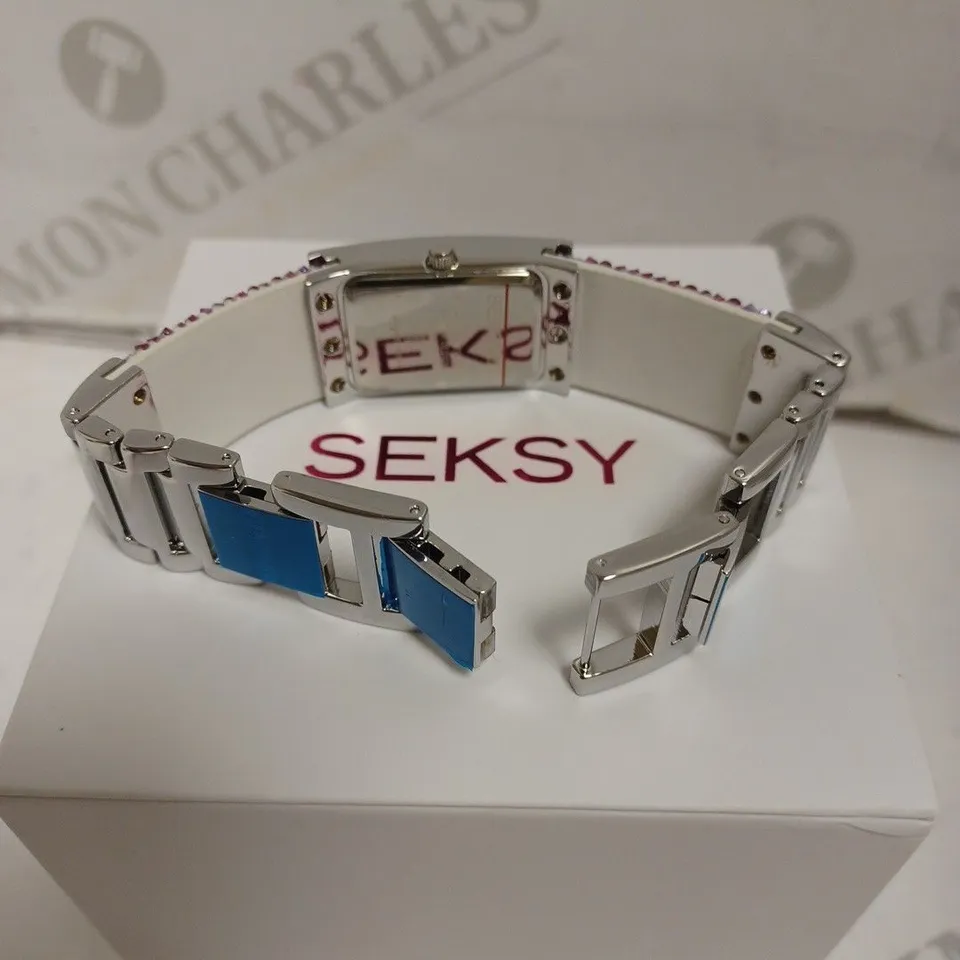 BOXED SEKSY BY SEKONDA LADIES STONE SET WATCH WITH STAINLESS STEEL BACK - JAPAN MOVEMENT. 