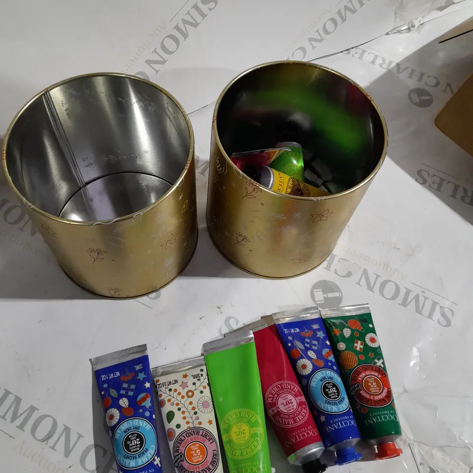 2 X TINS OF L'OCCITANE HAND CREAMS TO INCLUDE APPROXIMATELY 10 DIFFERENT SCENTS