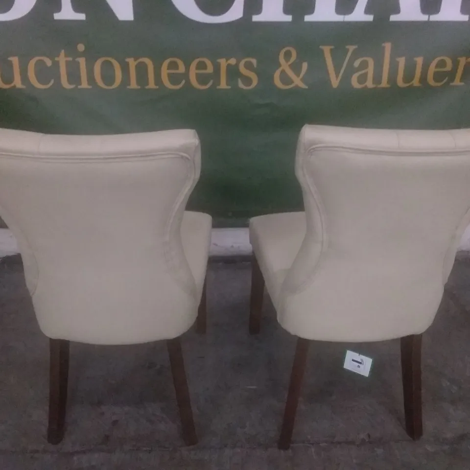 SET OF 2 NEW BEWLEY IVORY LEATHER BUTTON BACK DINING CHAIRS (DARK OAK LEG)
