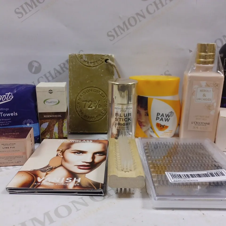 BOX OF APPROX 10 ASSORTED BEAUTY PRODUCTS TO INCLUDE REVOLUTION PRO BLUR STICK, L'OCCITANE BODY MILK, REVOLUTION UNDER EYE PRIMER, ETC 