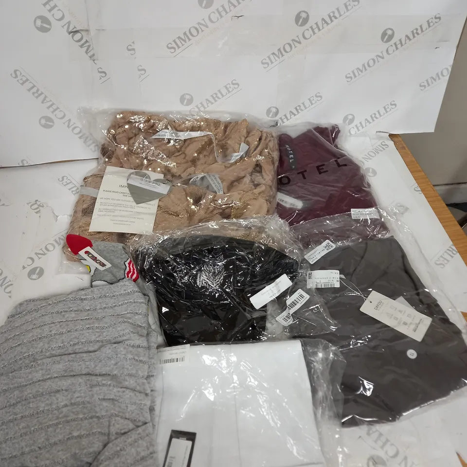 LARGE BOX OF ASSORTED CLOTHING ITEMS IN VARIOUS COLOURS AND SIZES INCLUDING TROUSERS , TOPS AND JUMPERS 