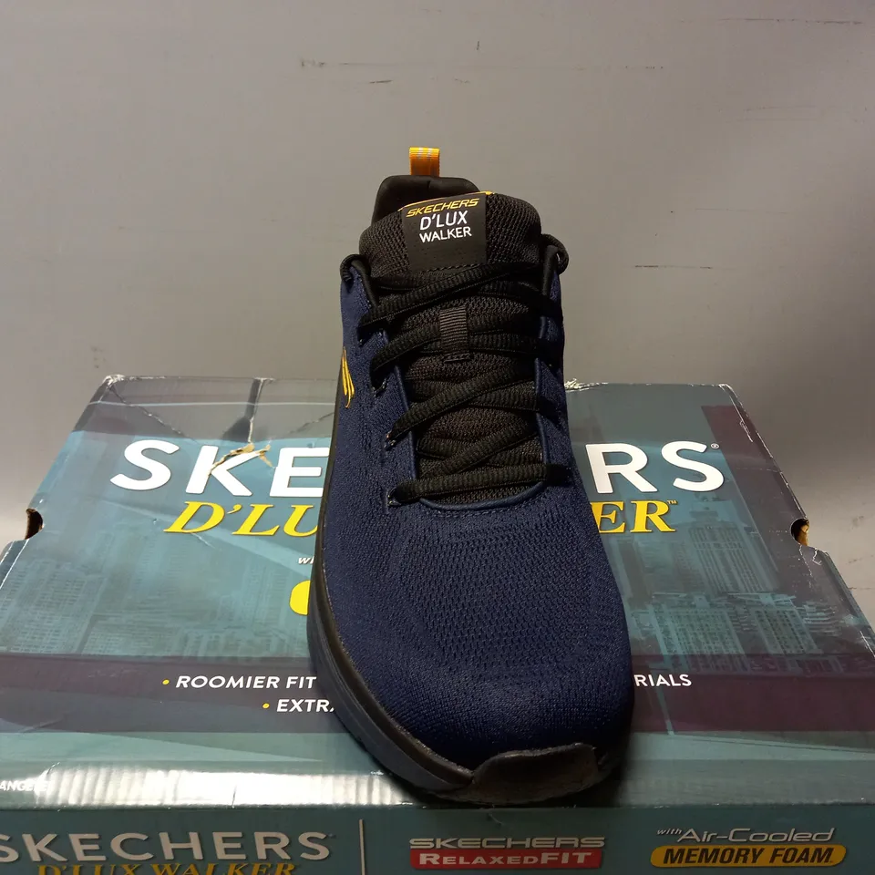 BOXED PAIR OF SKECHERS D LUX WALKERS IN NAVY TRAINER - SIZE 10