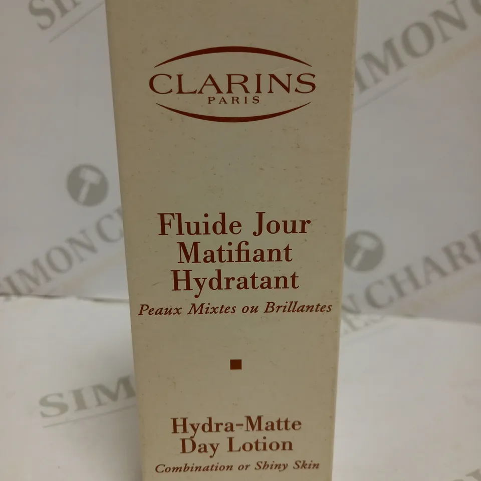 BOXED CLARINS HYDRA-MATTE DAY LOTION 