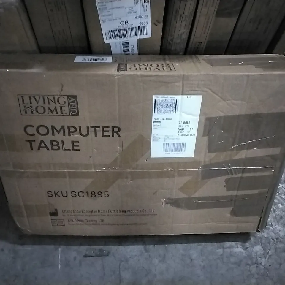 BOXED LIVING AND HOME COMPUTER TABLE 
