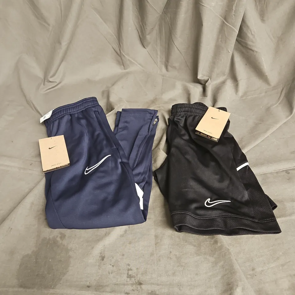 NIKE X2 ASSORTED KIDS CLOTHING ITEMS TO INCLUDE - TRACK PANTS IN NAVY - SHORTS IN BLACK - SIZE XS