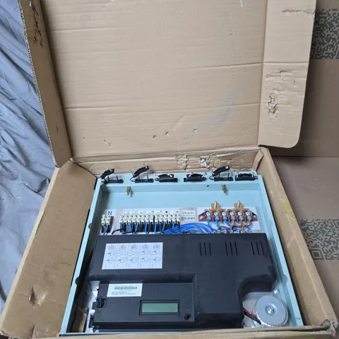 BURNER CONTROL UNIT FOR A HEATING SYSTEM OR COOKER