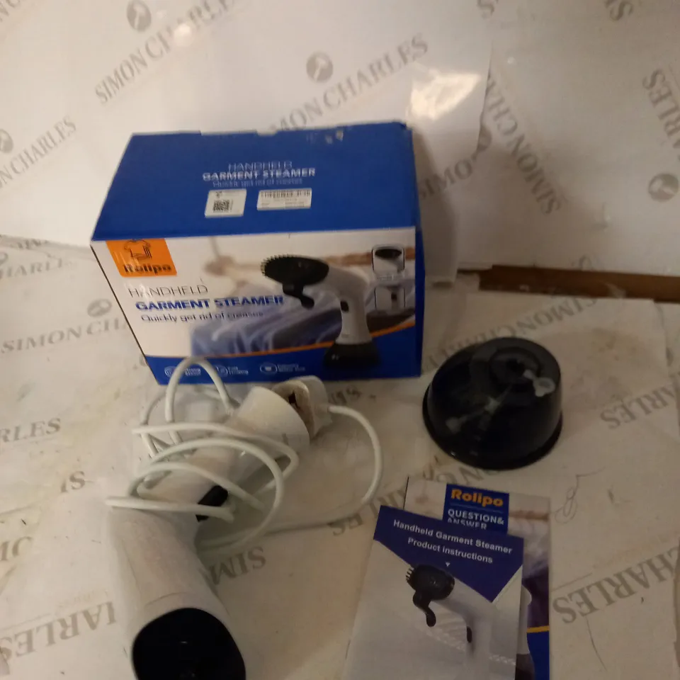 BOXED ROLIPO HANDHELD GARMENT STEAMER WITH INSTRUCTIONS