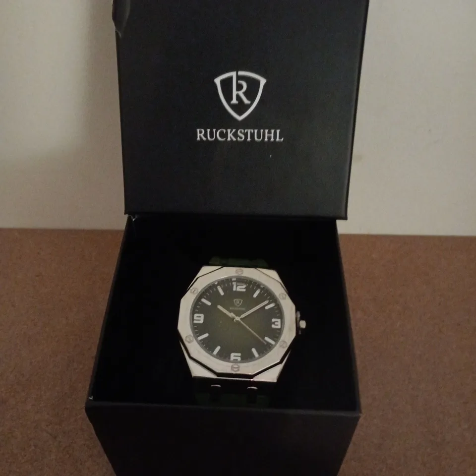 RUCKSTUHL SILVER COLOUR WRISTWATCH WITH GREEN RUBBER STRAP & DIAL