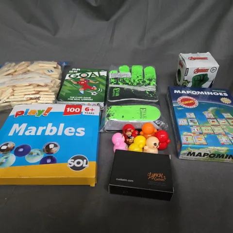 APPROXIMATELY 10 ASSORTED TOYS AND GAMES TO INCLUDE MARBLES, GOALKEEPER GLOVES AND CARD GAMES