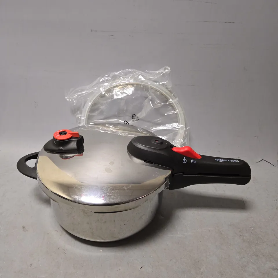 BOXED AMAZON BASICS PRESSURE COOKER 