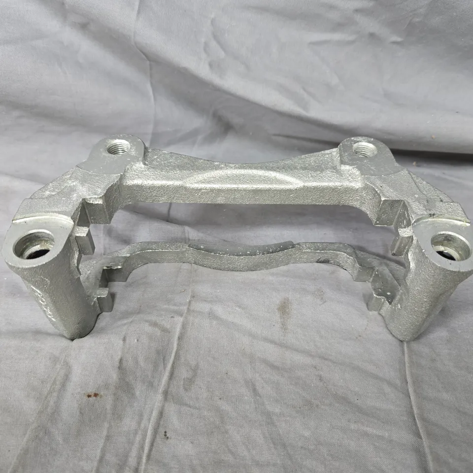 VEHICLE BRAKE CALIPER MOUNTING BRACKET – CAST METAL