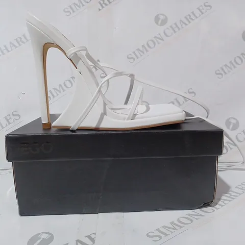 BOXED PAIR OF EGO SUPERLIT OPEN TOE HIGH HEEL SANDALS IN WHITE UK SIZE 4