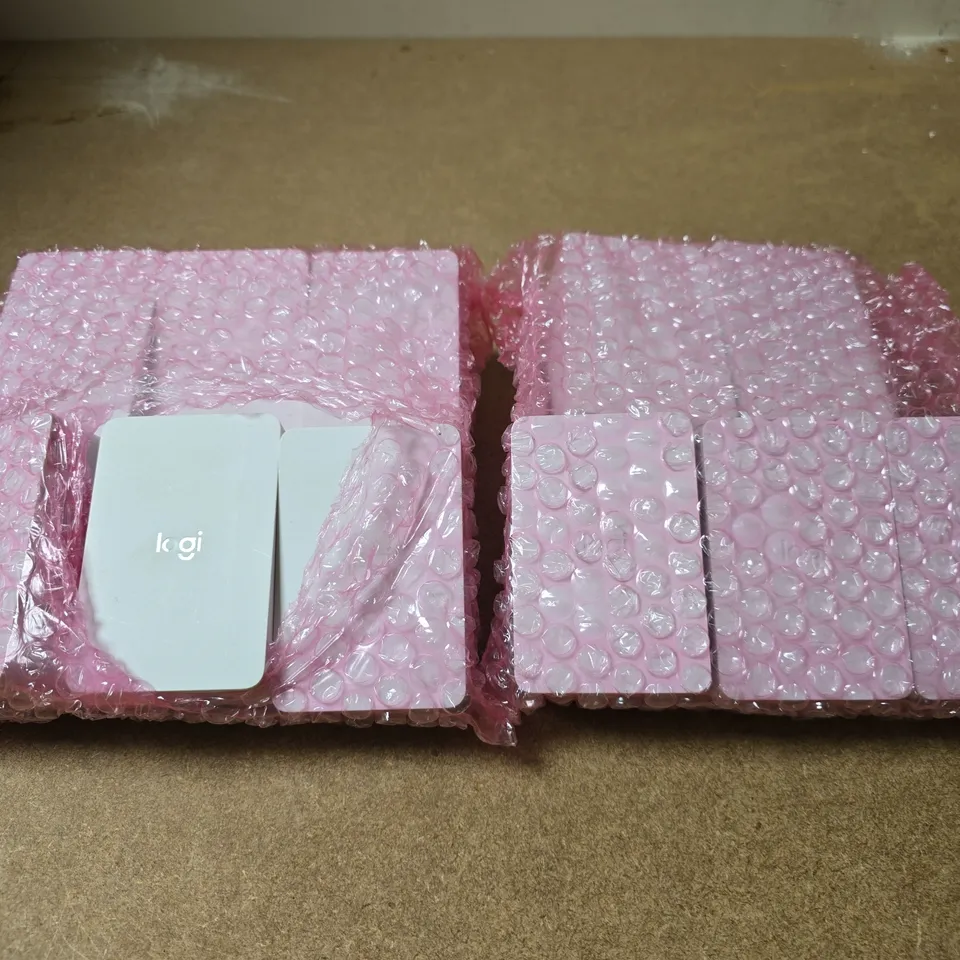 APPROXIMATELY 10 LOGITECH ETHERNET PLUG ADAPTERS