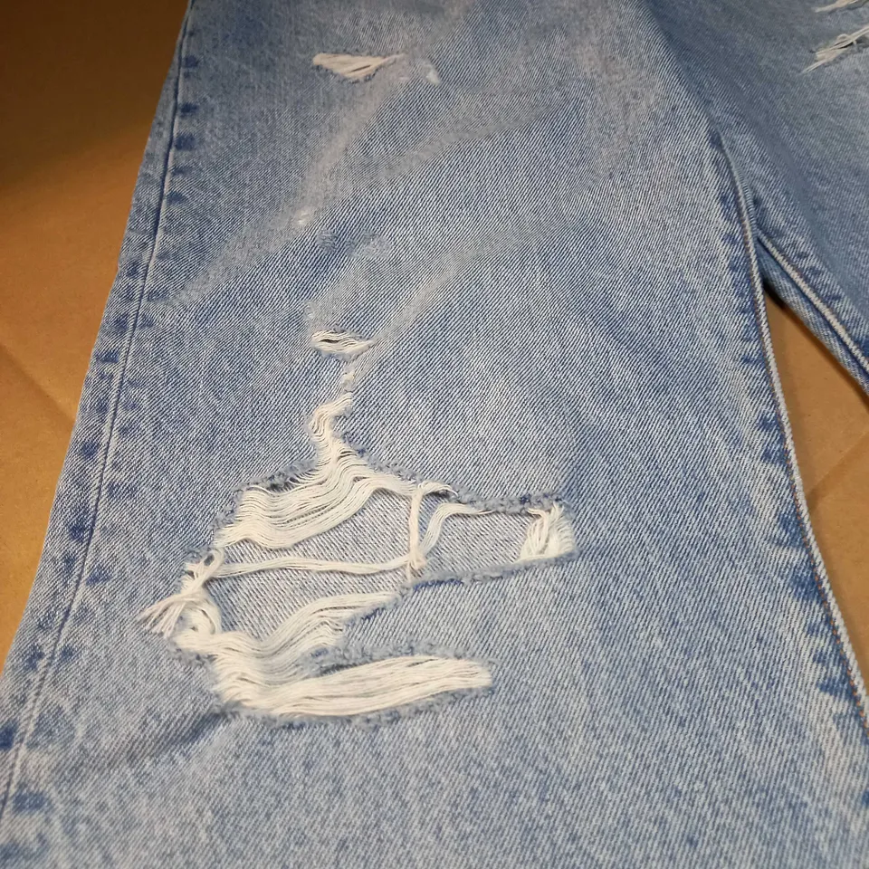 DESIGNER LIGHT BLUE RIPPED BUTTON UP JEANS