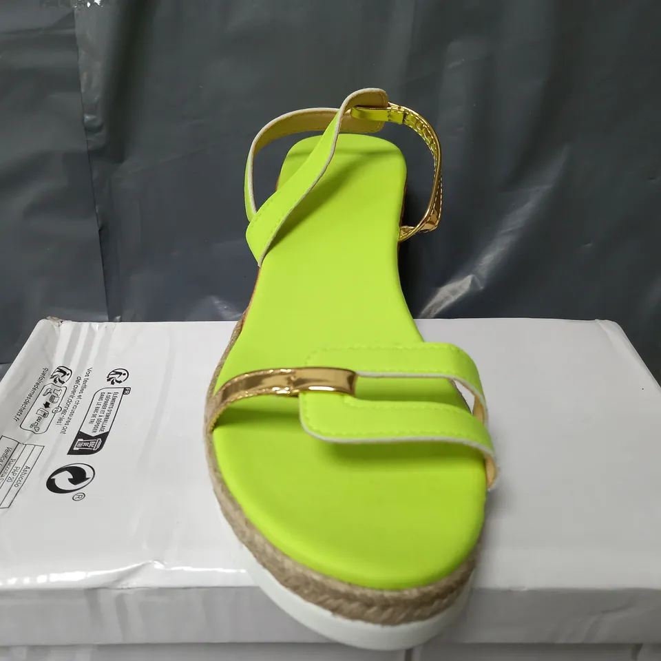 BOXED PAIR OF OPEN TOE RAISED SANDAL SHOES IN LIME GREEN - SIZE 42