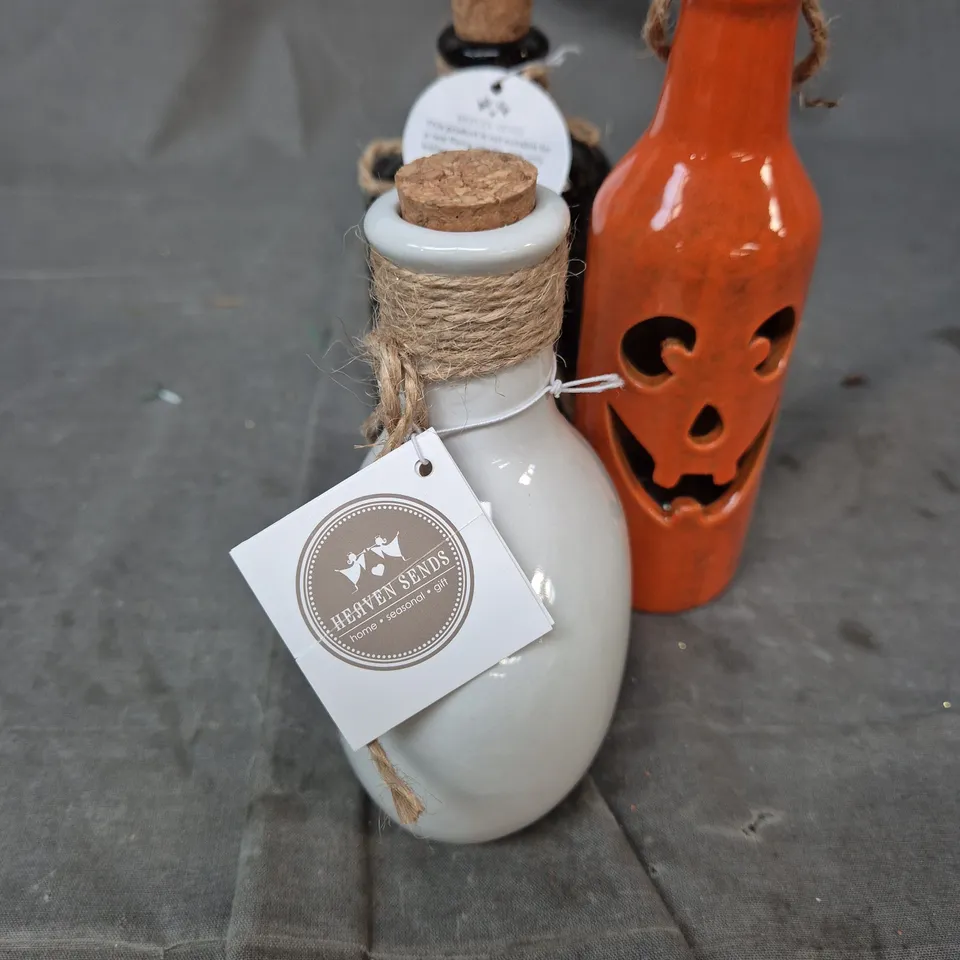HEAVEN SENDS – SET OF 3 HALLOWEEN JACK-O'-LANTERN DECORATIVE BOTTLES WITH CORK STOPPERS. 