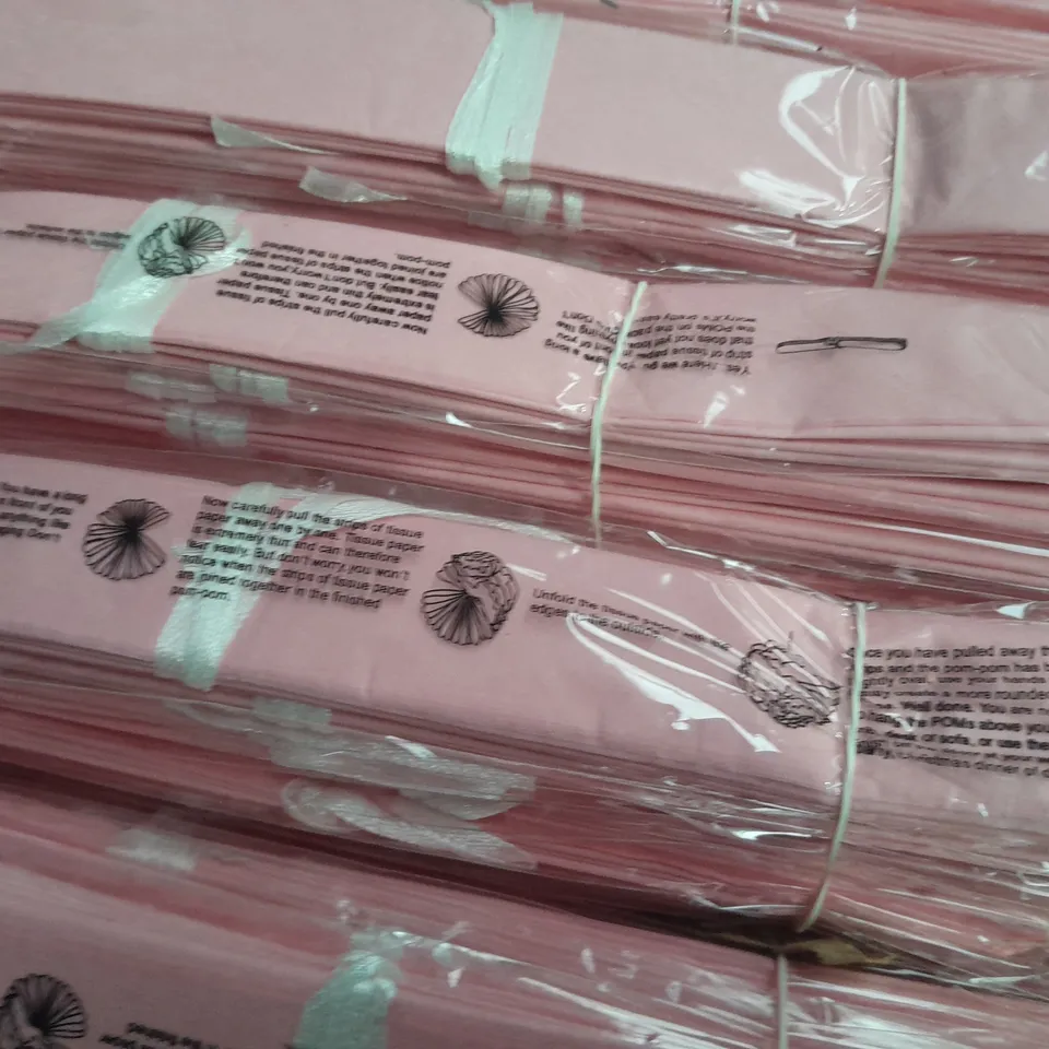 LOT OF APPROXIMATELY 1000 10" PINK TISSUE PAPER DECORATIONS