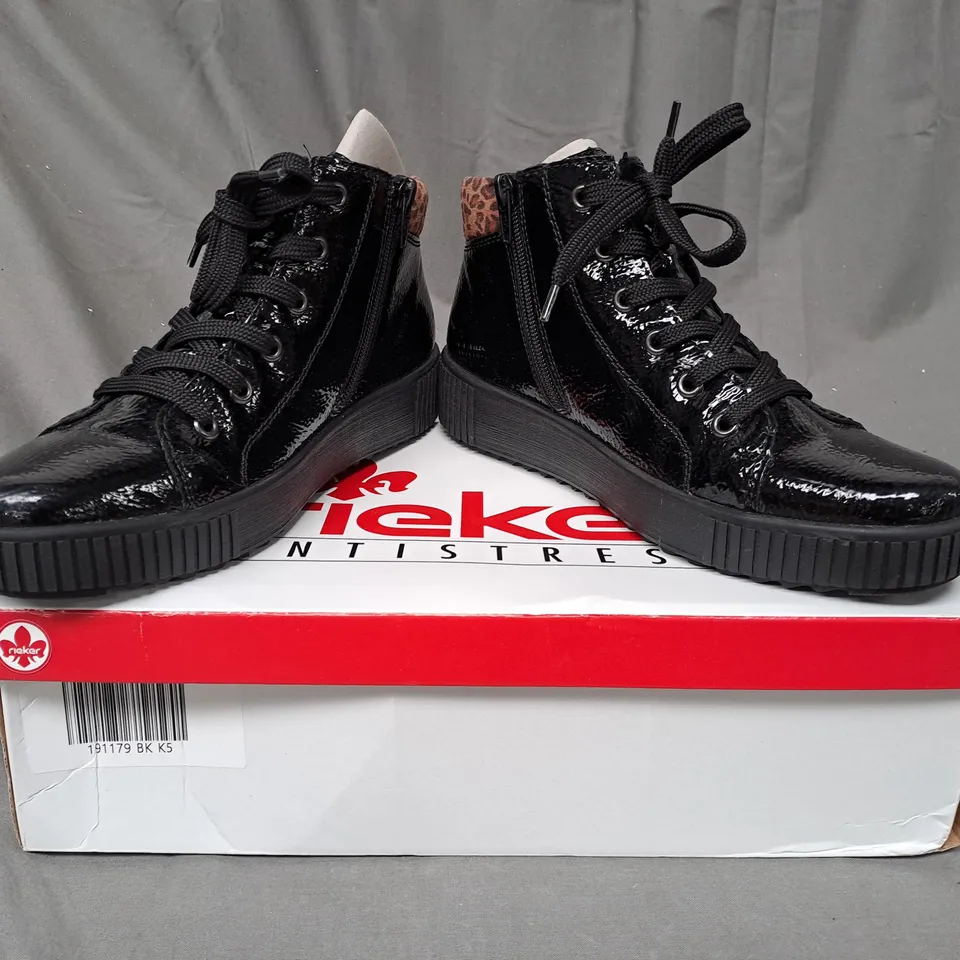 BOXED PAIR OF RIEKER HIGH TOP LEOPARD CUFF TRAINERS IN BLACK SIZE 5