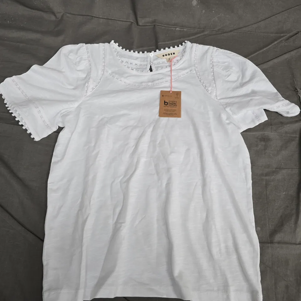 BODEN WHITE SHORT-SLEEVE TOP, UK 8 (US 4) – EYELET LACE & POM-POM TRIM