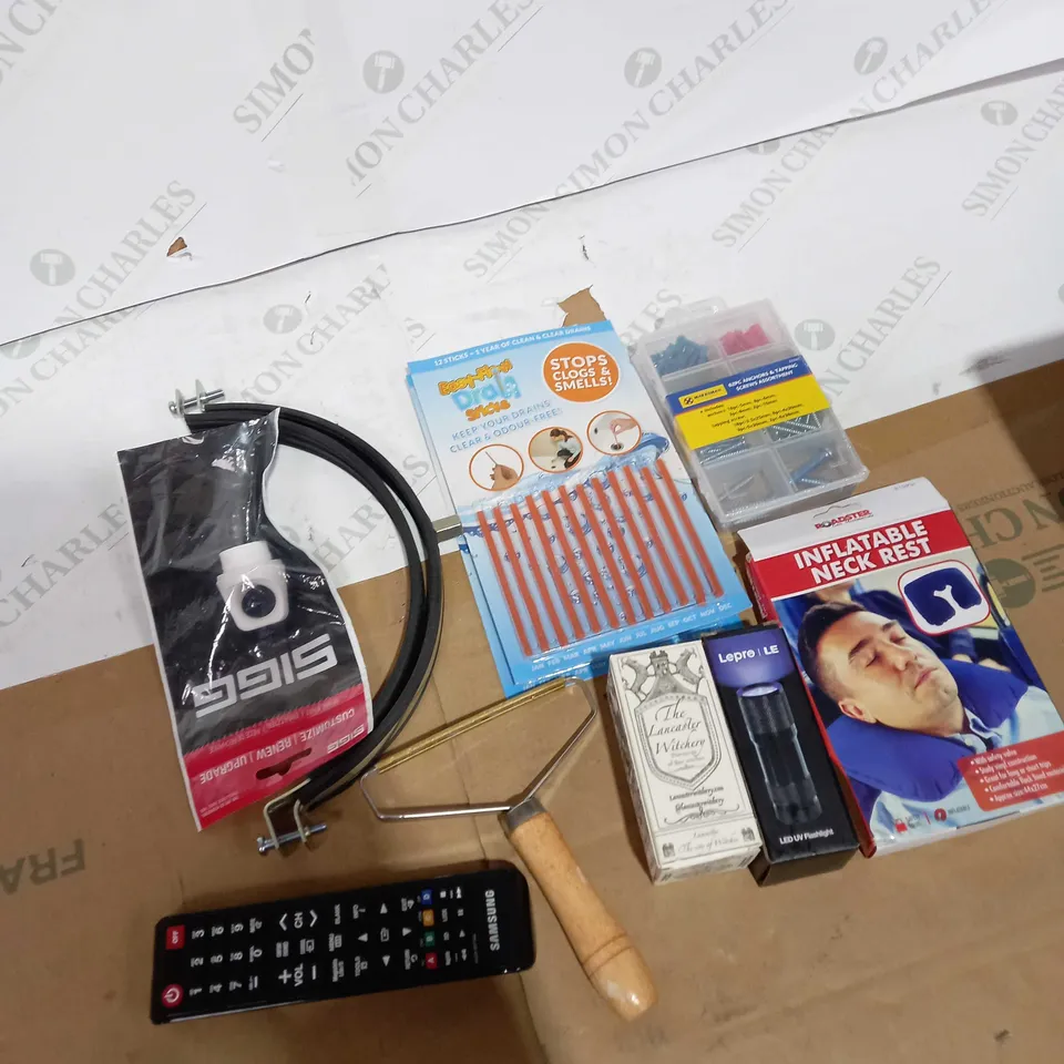 LOT OF ASSORTED HOUSEHOLD ITEMS TOO INCLUDE TV REMOTES AND FLASHLIGHTS 