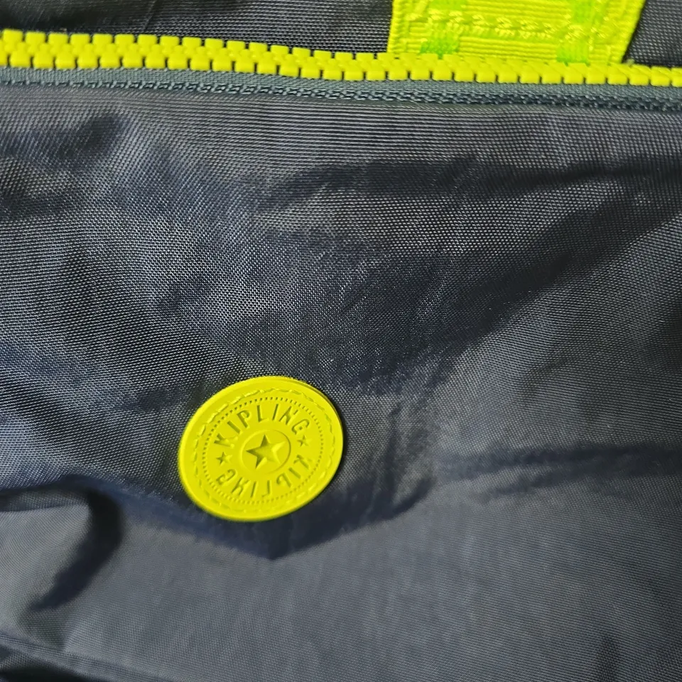 KIPLING NAVY  BAG WITH NEON YELLOW ACCENTS AND MONKEY CHARM