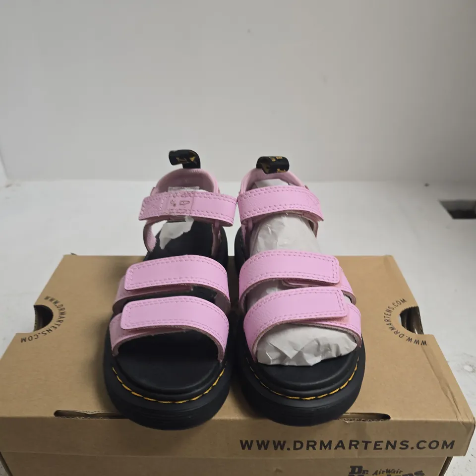 BOXED PAIR OF DR. MARTENS KLAIRE J ZEBRILUS KIDS SANDALS PALE PINK - UK 12