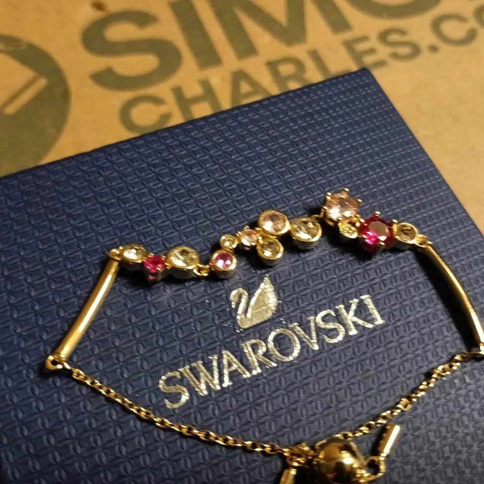 SWAROVSKI GOLD-TONE BRACELET WITH PINK AND CLEAR CRYSTALS – BOXED