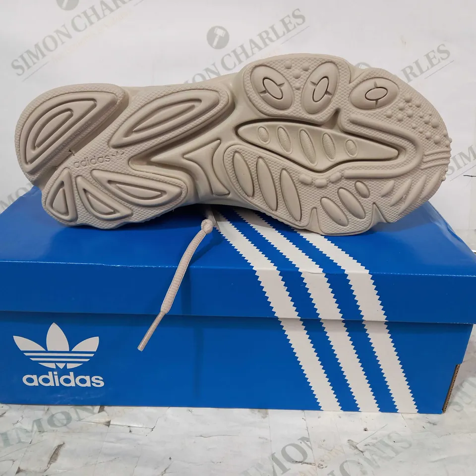 BOXED PAIR OF ADIDAS OZWEEGO SHOES IN BEIGE UK SIZE 7