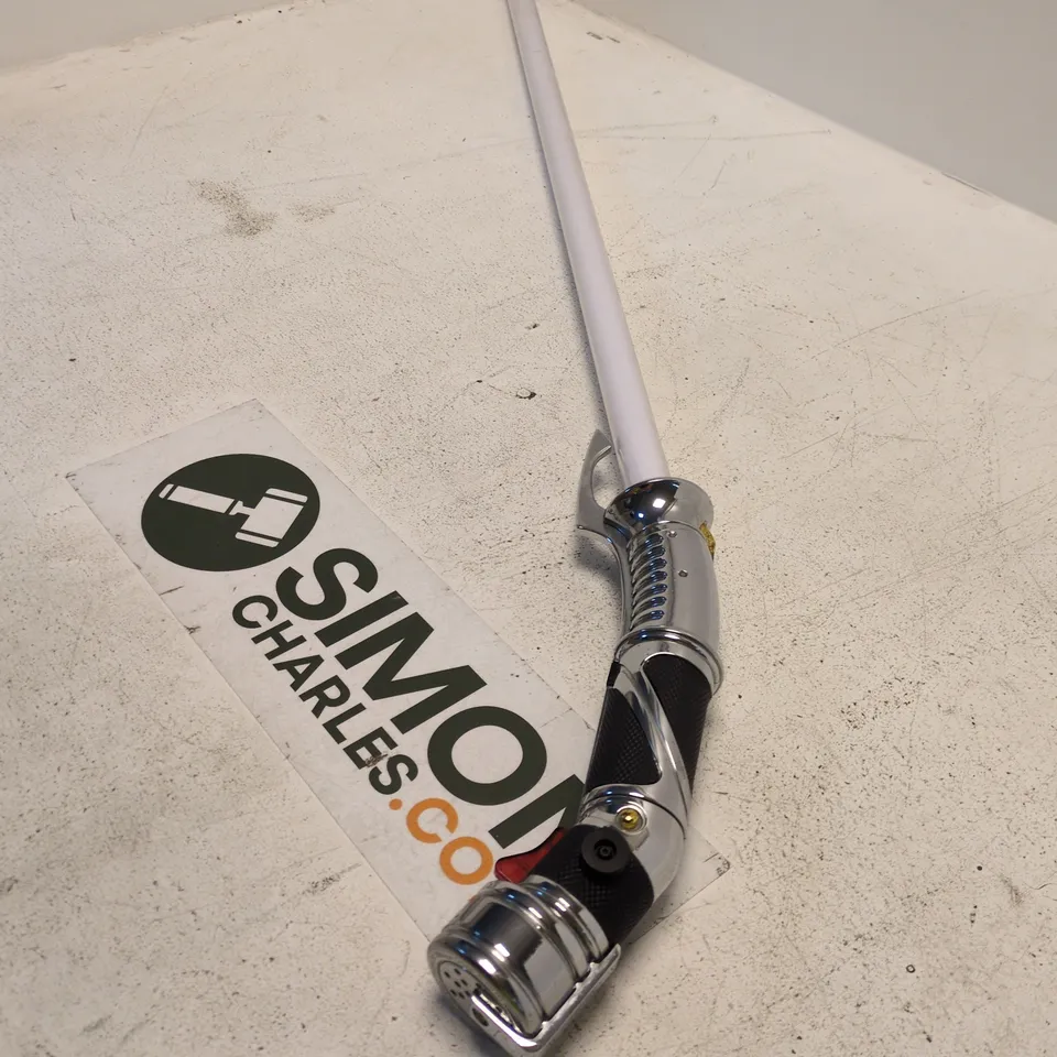 MODEL LIGHTSABER OF COUNT DOUKU WITH CHROME HILT AND WHITE BLADE TURNING RED. MADE BY HASBRO 2020.