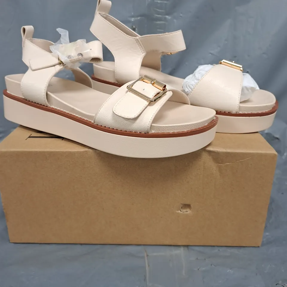 BOXED PAIR OF WHERE'S THAT FROM OPEN TOE PLATFORM SANDALS IN CREAM SIZE 5
