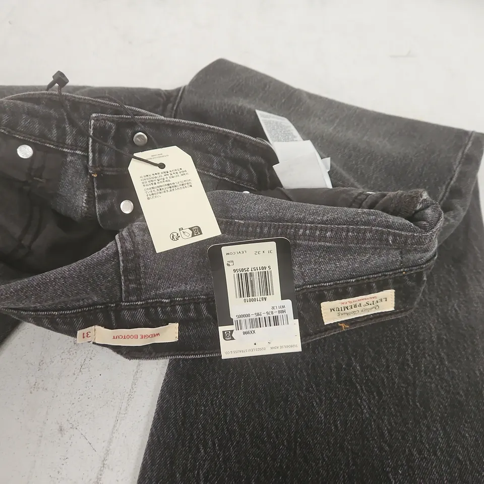 PAIR OF LEVIS WEDGIE BOOTCUT JEANS IN WASHED BLACK - 31X32