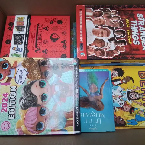 LARGE QUANTITY OF ASSORTED BOOKS AND 2024 ANNUALS TO INCLUDE LOL SURPRISE, BEANO, MINECRAFT AND STRANGER THINGS