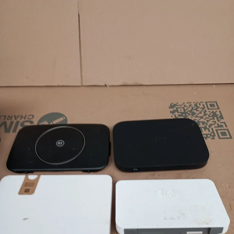 TOTE OF APPROXIMATELY 5 ASSORTED ITEMS INCLUDING SKY AND BT WIFI ROUTERS AND BT LANDLINE PHONE