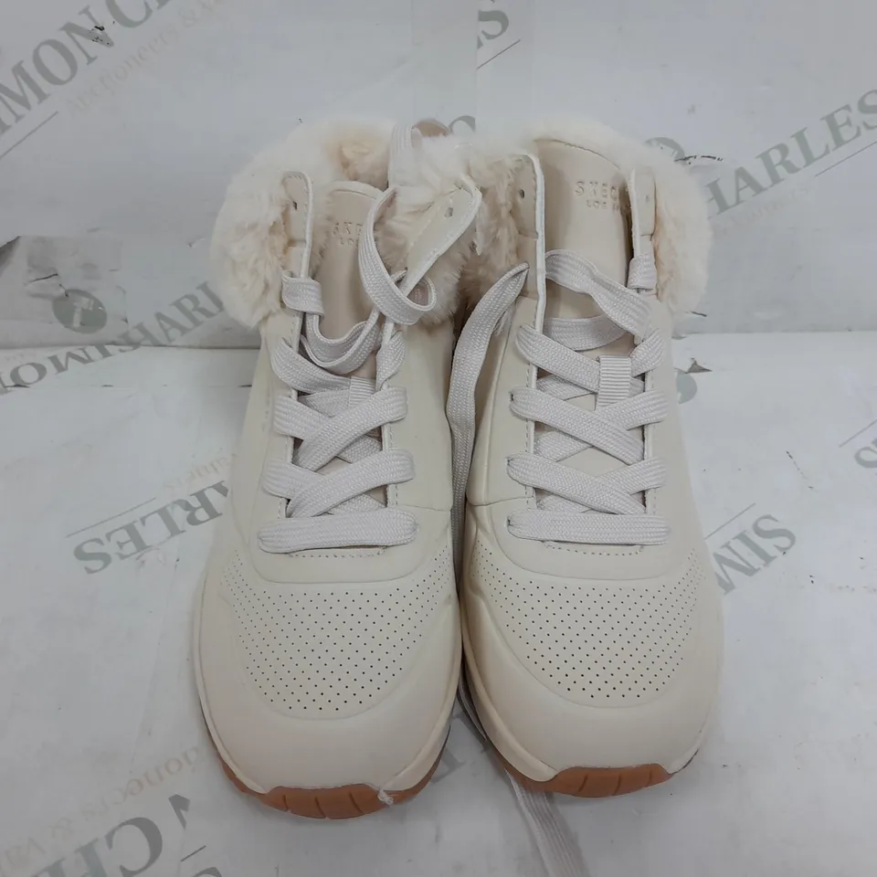 PAIR OF SKETCHERS FAUX FUR DECORATED TRAINERS IN CREAM - UK 2
