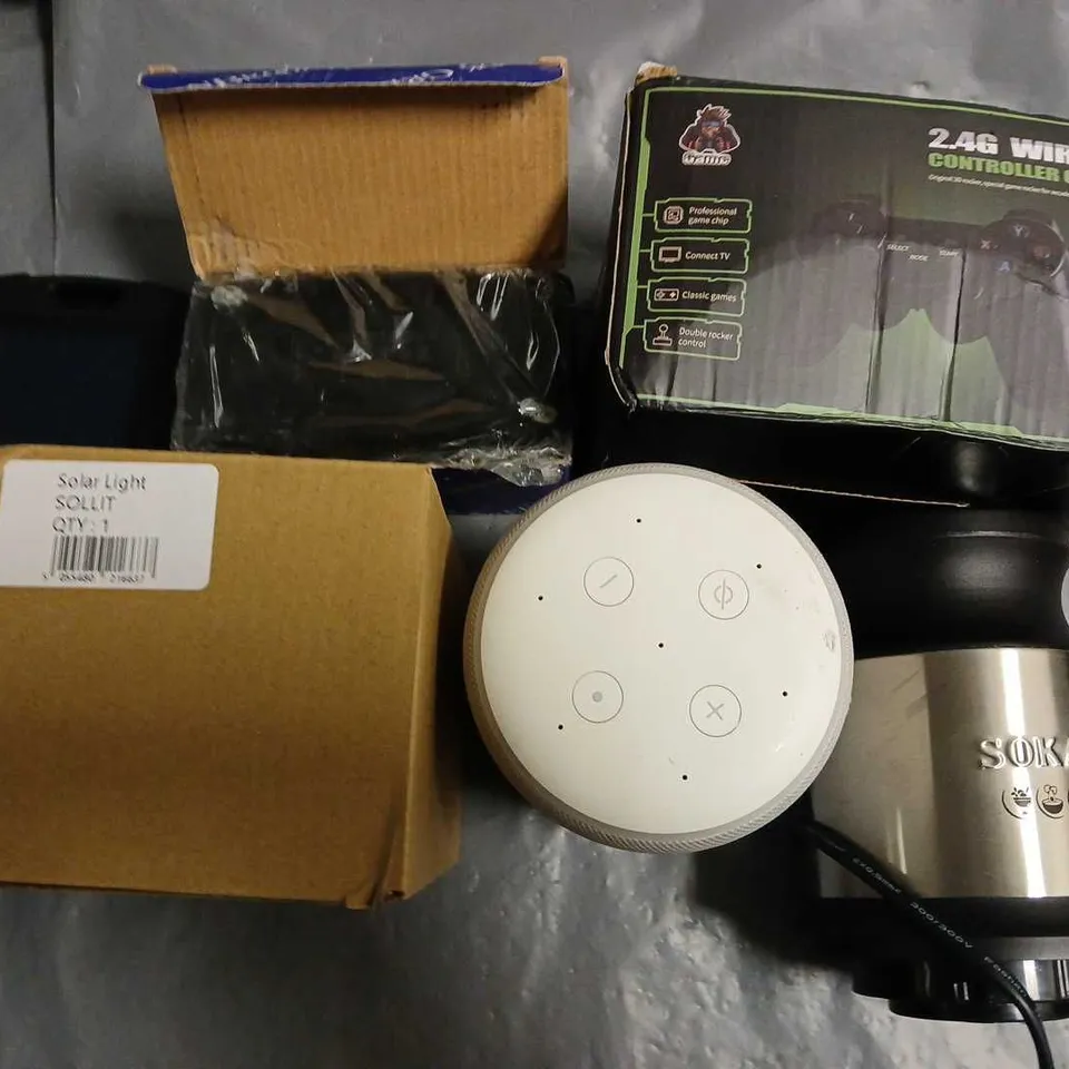 lot of 8 assorted items to include portable speaker, solar light and controller gamepad