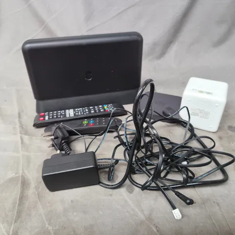 APPROXIMATELY 15 ASSORTED HOUSEHOLD PRODUCTS TO INCLUDE EE WIFI BOXES , SKY BOXES , TV REMOTES , ETC 