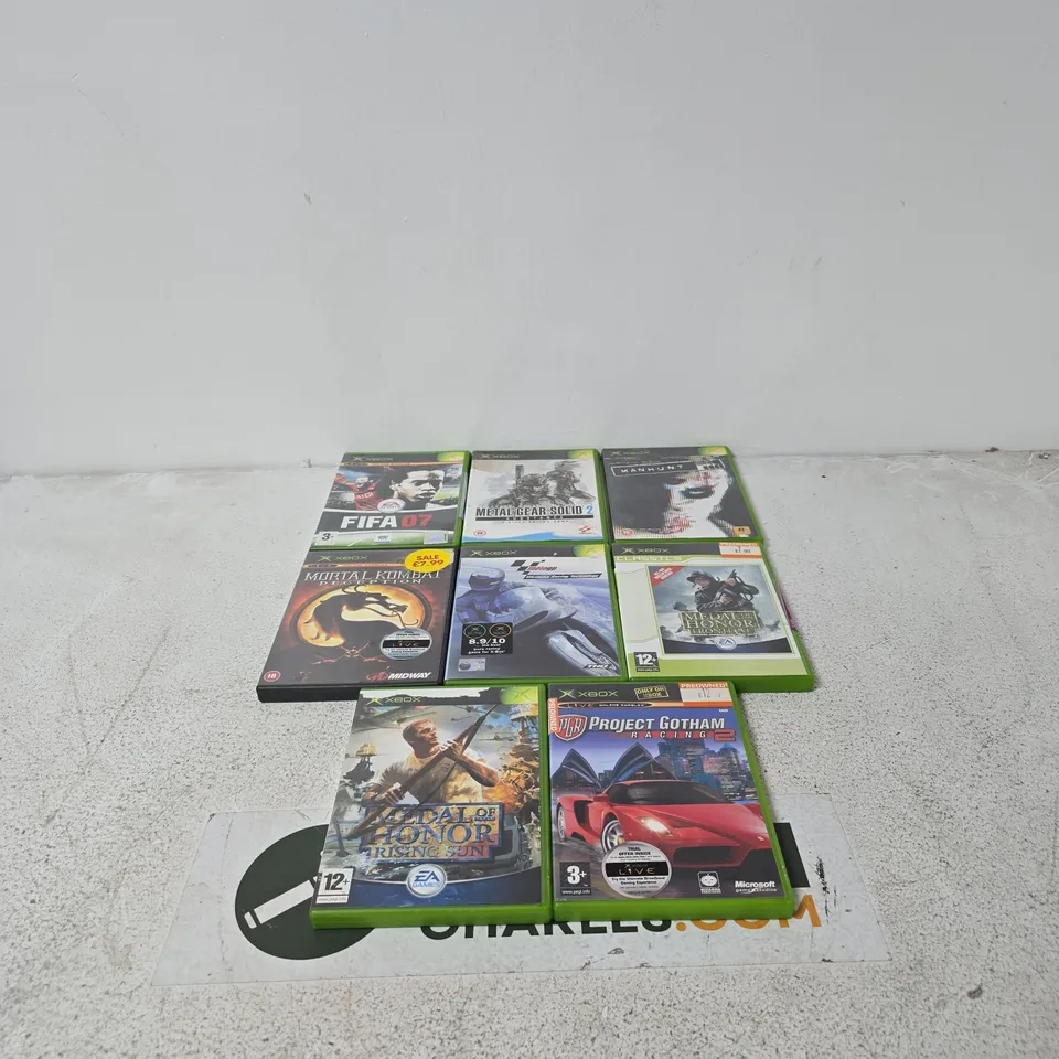 TOTE OF APPROXIMATELY 12 ASSORTED X BOX VIDEO GAMES TO INCLUDE METAL GEAR SOLID 2, MANHUNT, MEDAL OF HONOR FRONTLINE, MORTAL KOMBAT DECEPTION ETC