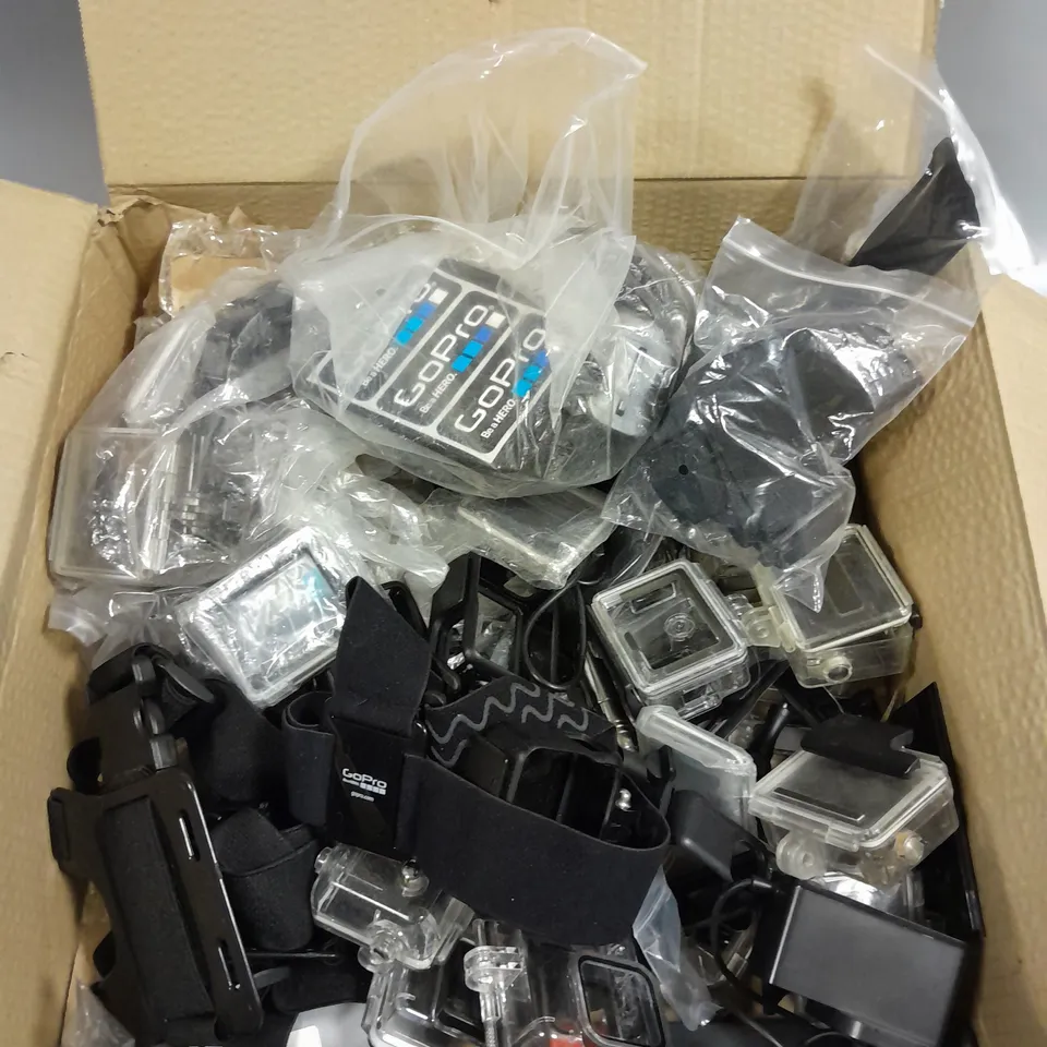 APPROXIMATELY 40 ASSORTED GO-PRO ACCESSORIES TO INCLUDE STRAPS, PROTECTIVE CASES, FLOATS ETC 