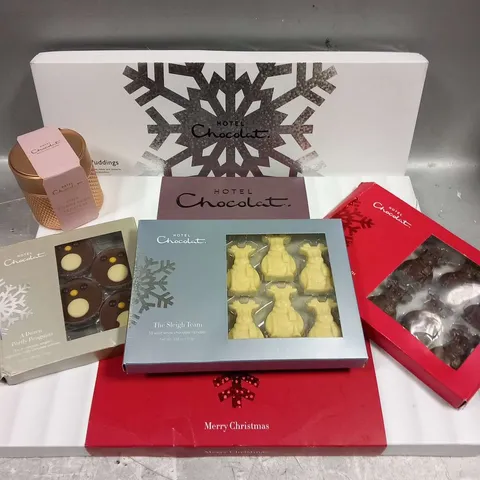 APPROXIMATELY 10 ASSORTED HOTEL CHOCOLAT PRODUCTS TO INCLUDE; WINTER PUDDINGS, TIPSY TRUFFLES, MERRY CHRISTMAS, THE SLEIGH TEAM, PINK CHAMPAGNE TRUFFLES AND A DOZEN PORTLY PENGUINS