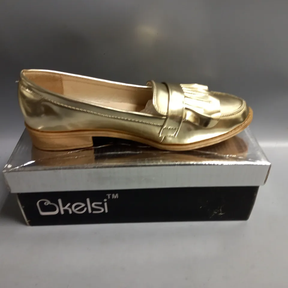 BOXED KELSI LADIES FLAT GOLD BROGUES. SIZE 5
