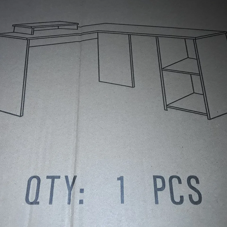 PALLET CONTAINING 18 BOXED L-SHAPED DESKS