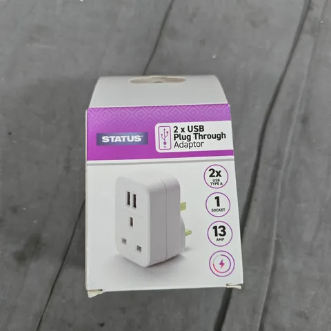 TOTE OF APPROXIMATELY 15 ASSORTED ITEMS TO INCLUDE: PLUG ADAPTER AND MINI DOORBELL